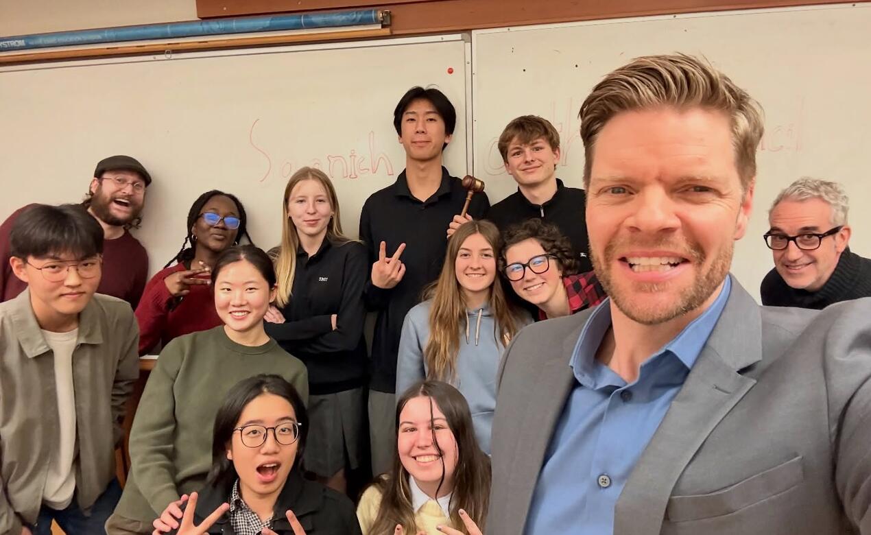 Saanich Mayor Dean Murdock takes a selfie at the Saanich Mayor's Youth Council meeting hosted by SMUS
