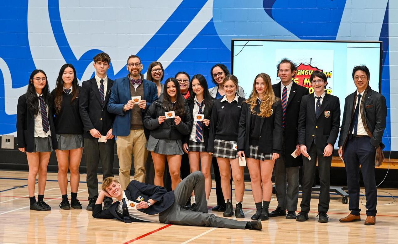 Students and staff receive stickers saying Multilingualism is my Superpower