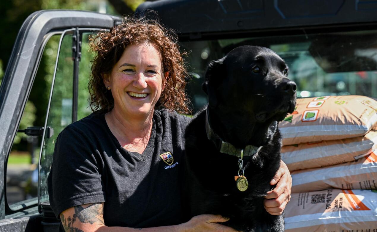 Portrait of Cathy Beglau and her dog