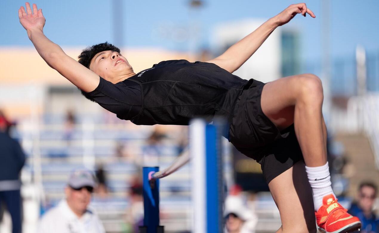 William Low clears the high jump