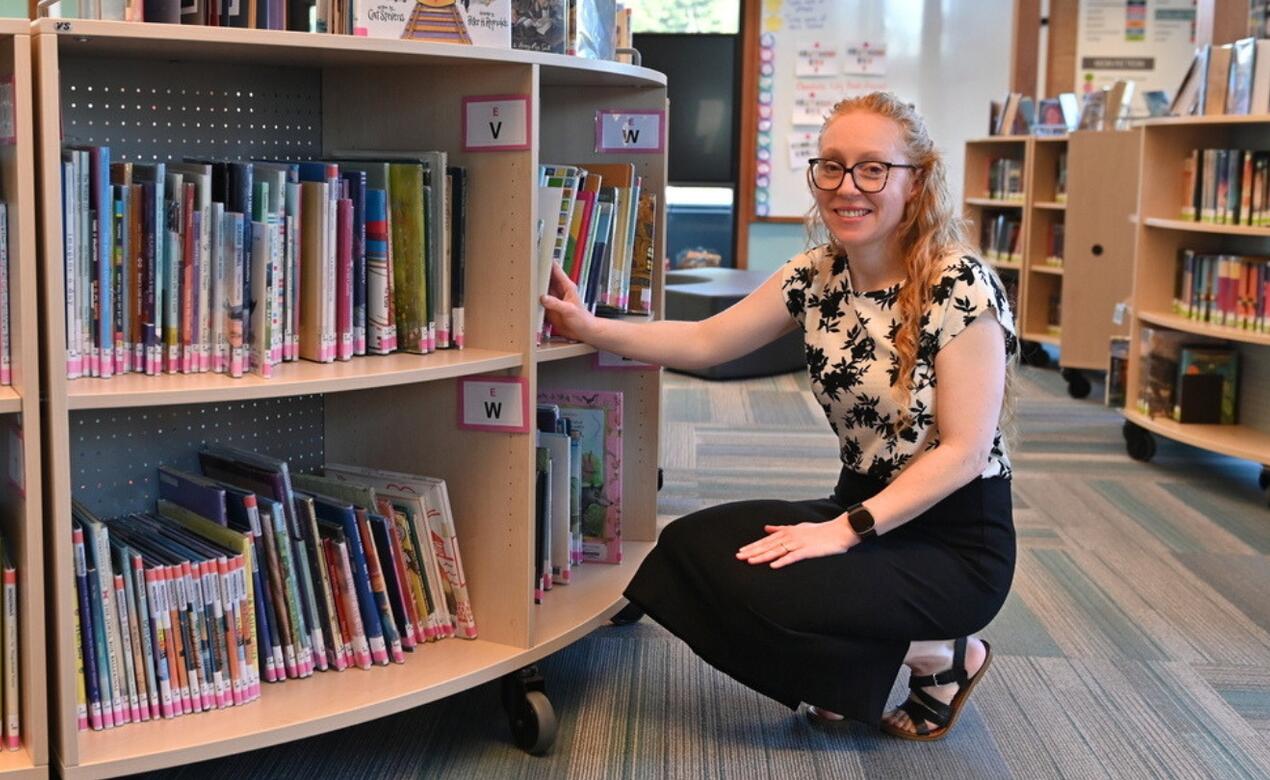 Thea Wilson-Scorgie in the SMUS Junior School library