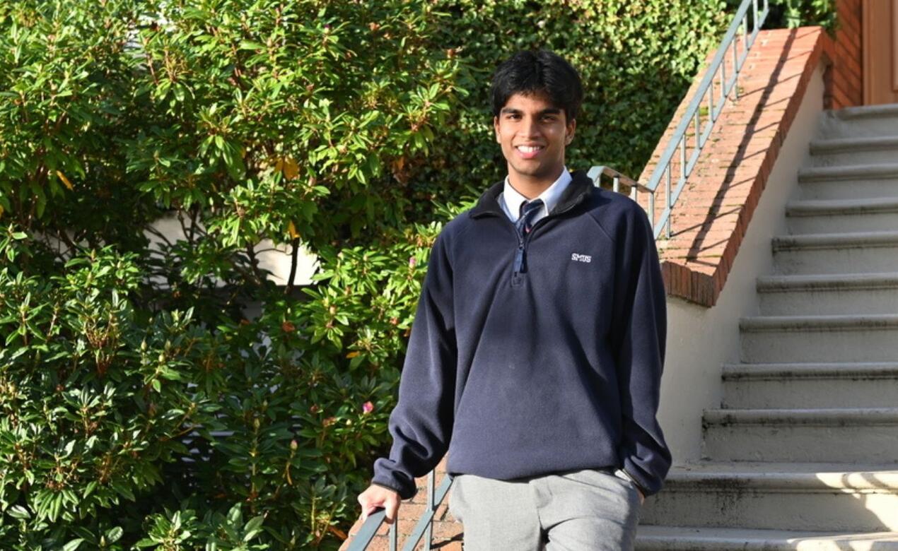 Gautam Jay on the front steps of School House