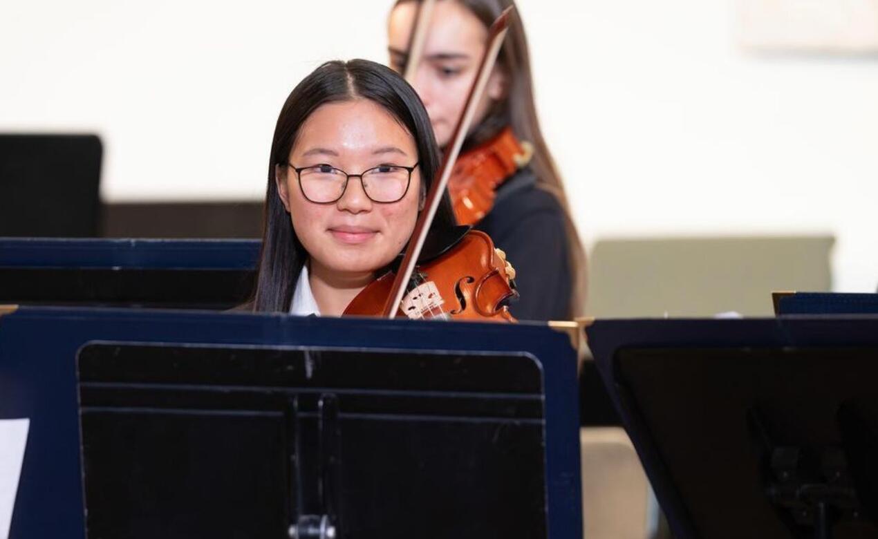 Isabelle Wu playing in strings concert
