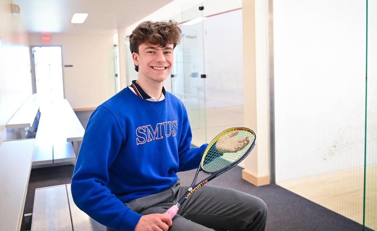 Anderson Brown next to the squash courts
