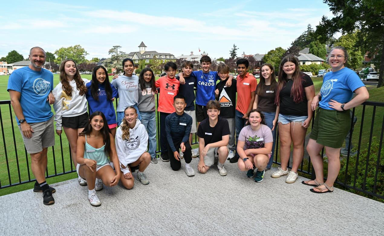 Group photo of Grade 8 WEB Leaders on the balcony of Wenman Pavillion