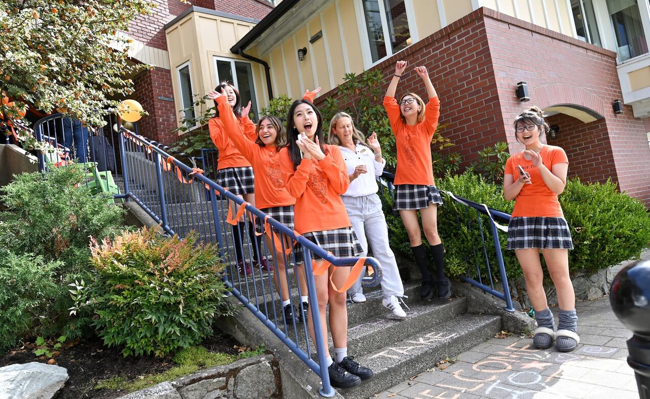 Timmis House members cheer as they welcome new students