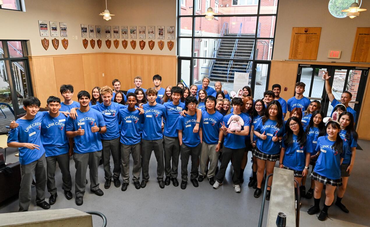 A group photo of all the Grade 12 Link Leaders in their themed shirts