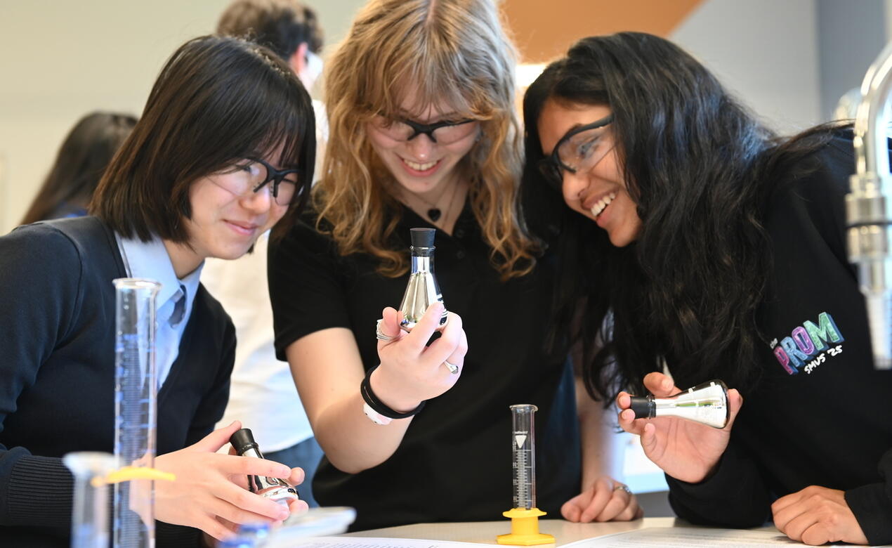 Grade 12 students work together in the Science Classroom