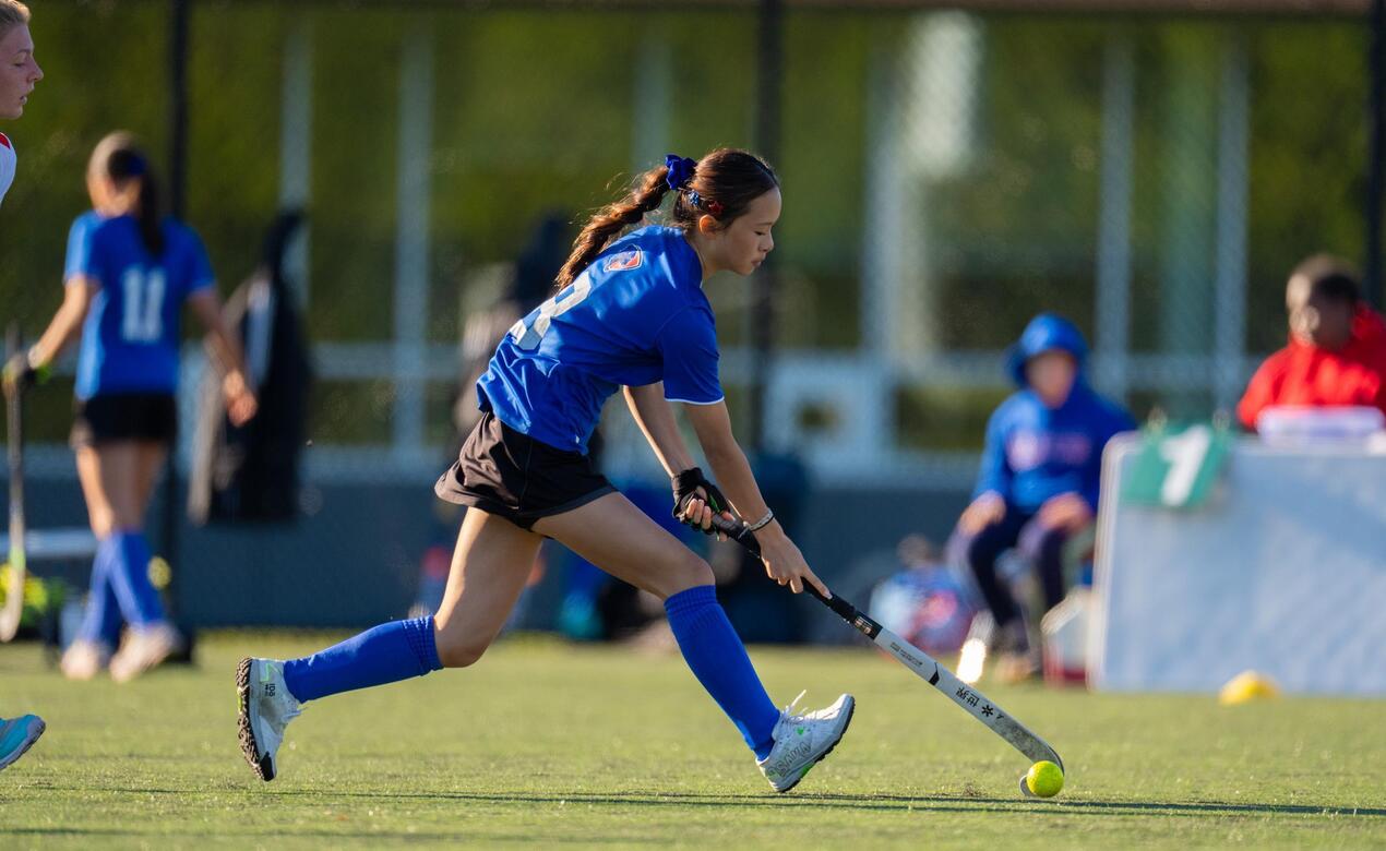 Senior Girls Field Hockey action Iris Wu