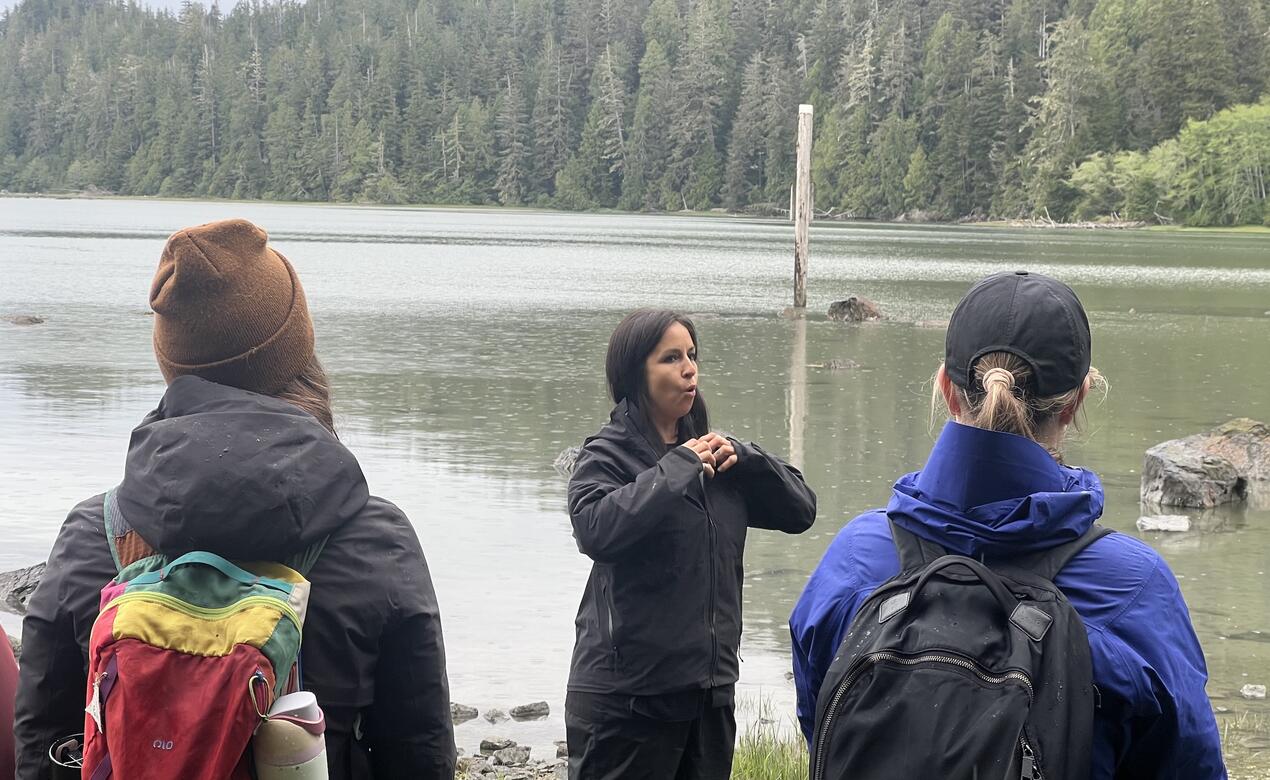 Gisele Martin outside teaching faculty and staff at Meares Island