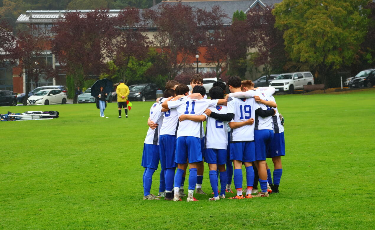 Senior Boys Soccer huddle