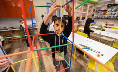 Junior School student erecting a structure in the Imagination Lab