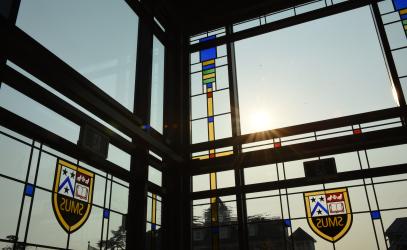 SMUS crests in stained glass on the Sun Centre