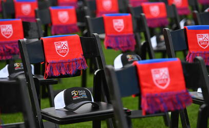 Jubilee hats and scarves on chairs waiting for the ceremony to begin