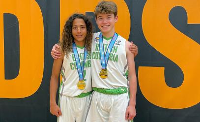 Dani and Parker pose with their golf medals after the BC Summer Games