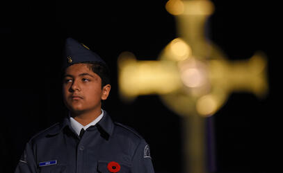 A Middle School student wears a uniform during the Remembrance Day Service.