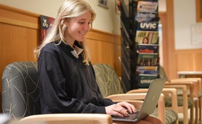 A Senior School student works on a laptop in the University Counselling department at SMUS