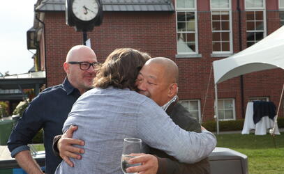 two old friends embrace at the 2022 35+ year reunion
