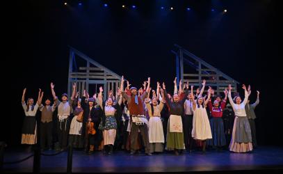 The cast of Fiddler on the Roof, the Senior School musical, performs on stage at the McPherson Playhouse.
