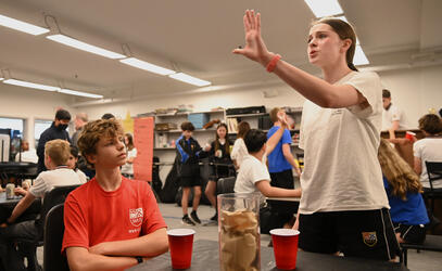 Students rehearse a scene for School of Rock