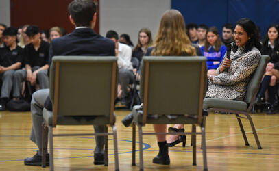 Alumna Gargee Ghosh speaks during a Senior School assembly
