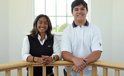 Head Prefects Maya Achuthan and Aidan MacKay pose in the SMUS bell tower
