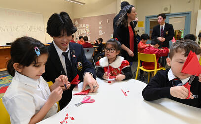 Junior School students creating shapes with Senior School students