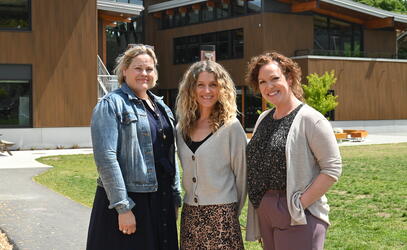 Junior Kindergarten Teachers pose in front of the Junior School Annex