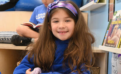 Junior School student Naia smiles in class