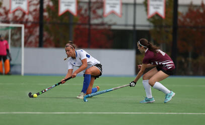 A SMUS player stretches to make a pass