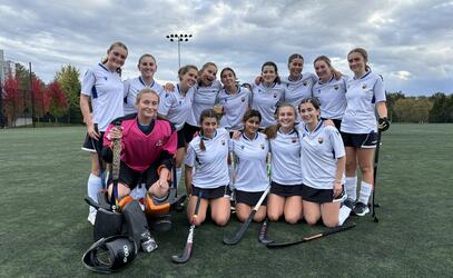 SMUS senior field hockey team pose for a group photo after a league game win against Mount Douglas. 