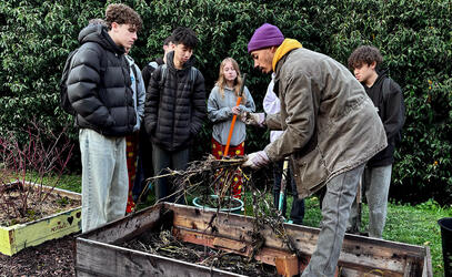 Grade 10 students learn about composting on Service Day