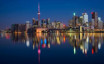 Toronto skyline over the canal at night