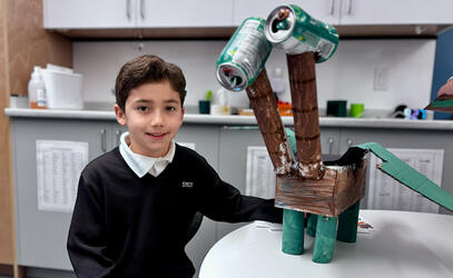 Grade 3 students shows off his supercreature