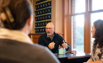 Senior School teacher Mat Geddes shares in a small group discussion. 