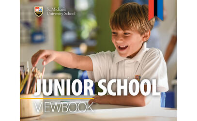The cover of the Junior School Viewbook depicting a young student reaching for some pencils for their art piece