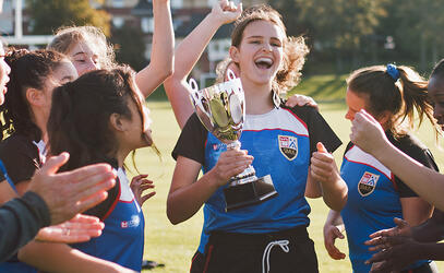 Cheering girls celebrate their tournament win
