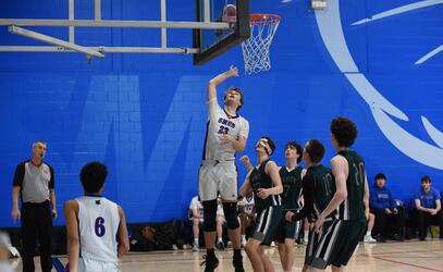 Action shot of Senior Boys Basketball