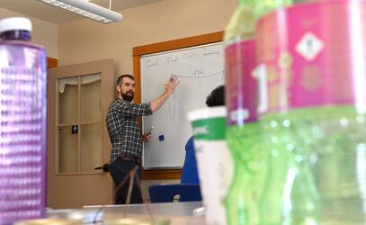 SMUS Alumni Dr. Trefor Bazett teaches a math class 
