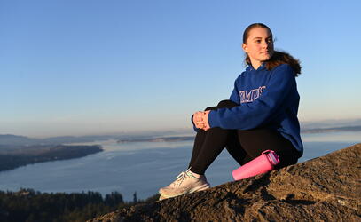 Senior School student Amelie Fleck looks out on the beautiful city at the top of Mount PKOLS.