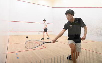 Senior Squash Action Photo
