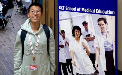 Senior Alumni Samuel Tang poses with a King's College London Med School sign