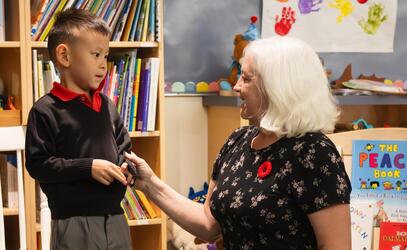 Kindergarten teacher Katie McNeil with a student