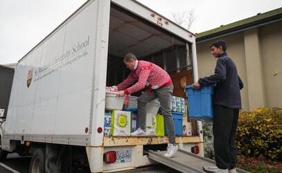 Middle School loading holiday hampers for HerWay Home 