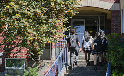 Senior Students walking into boarding