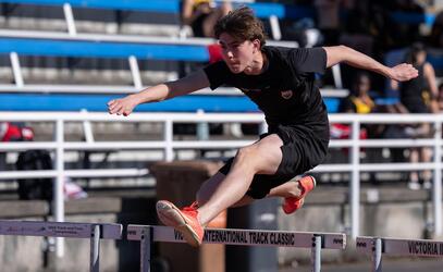 Will Hamilton competes in the hurdles event at Lower Island track and field meet