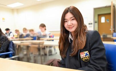 Ashley Baek in a classroom