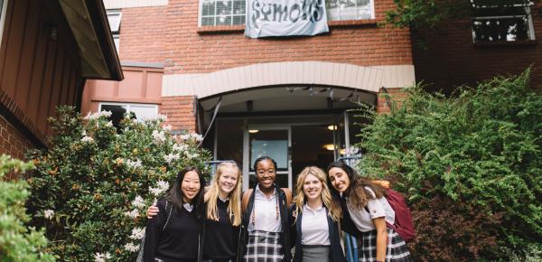 A group of Symons House students outside the boarding house