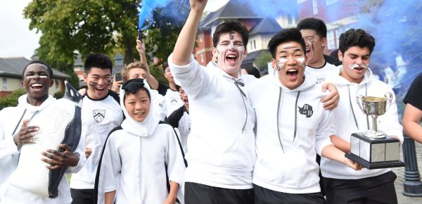 Boarding students celebrating a big win