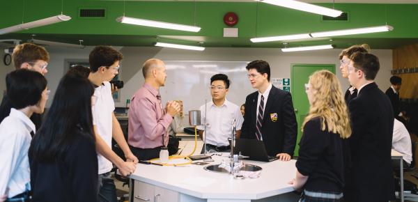 Senior School class in the science lab with teacher